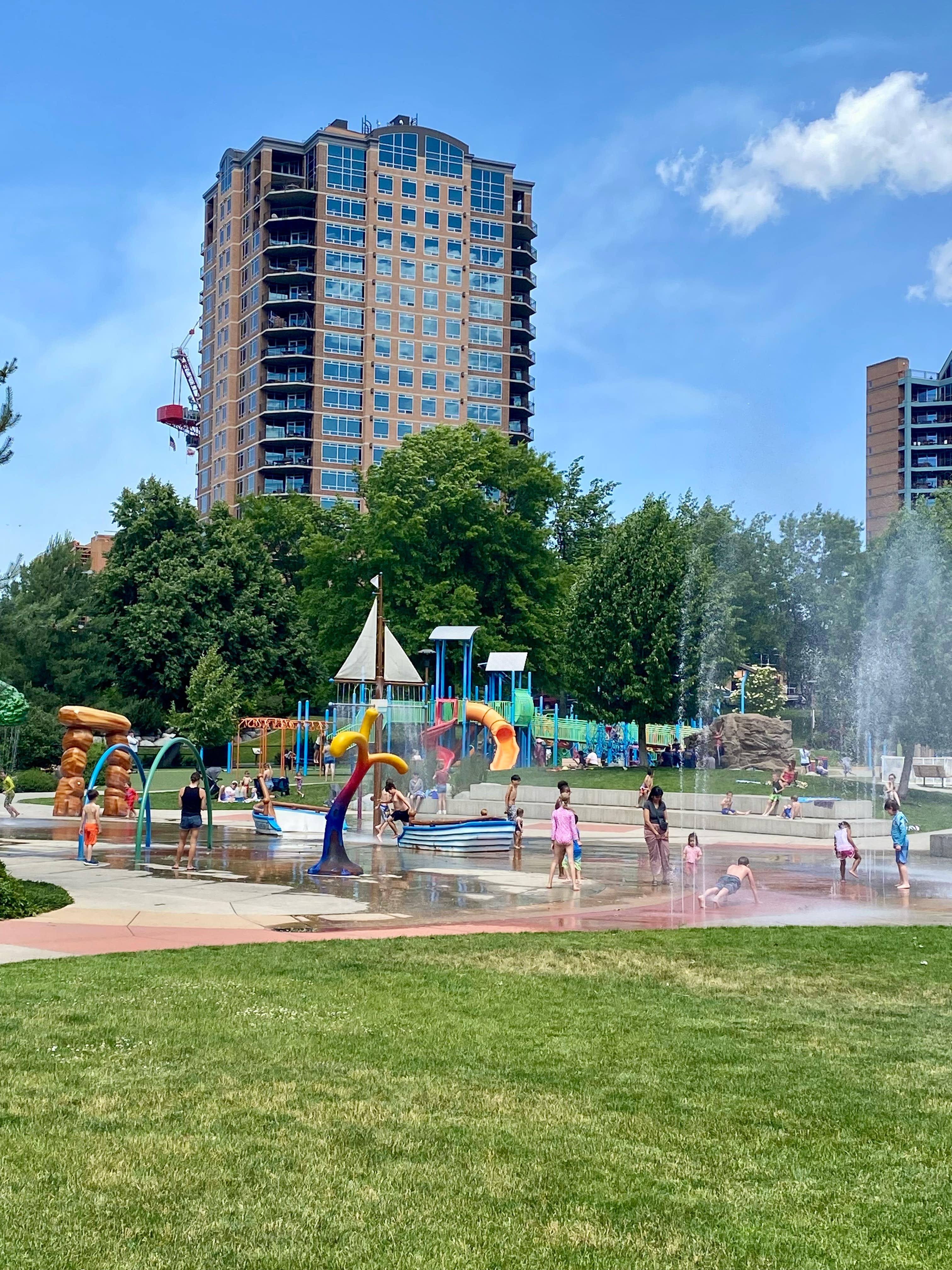 McEuen Park splash pad and waterfront in downtown Coeur d'Alene Idaho on Lake Coeur d'Alene -- family-friendly lakefront park